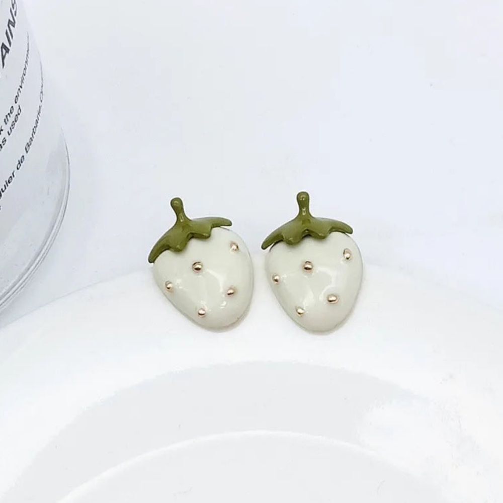 White strawberry clip on earrings A848